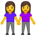 两个女人手牵着手